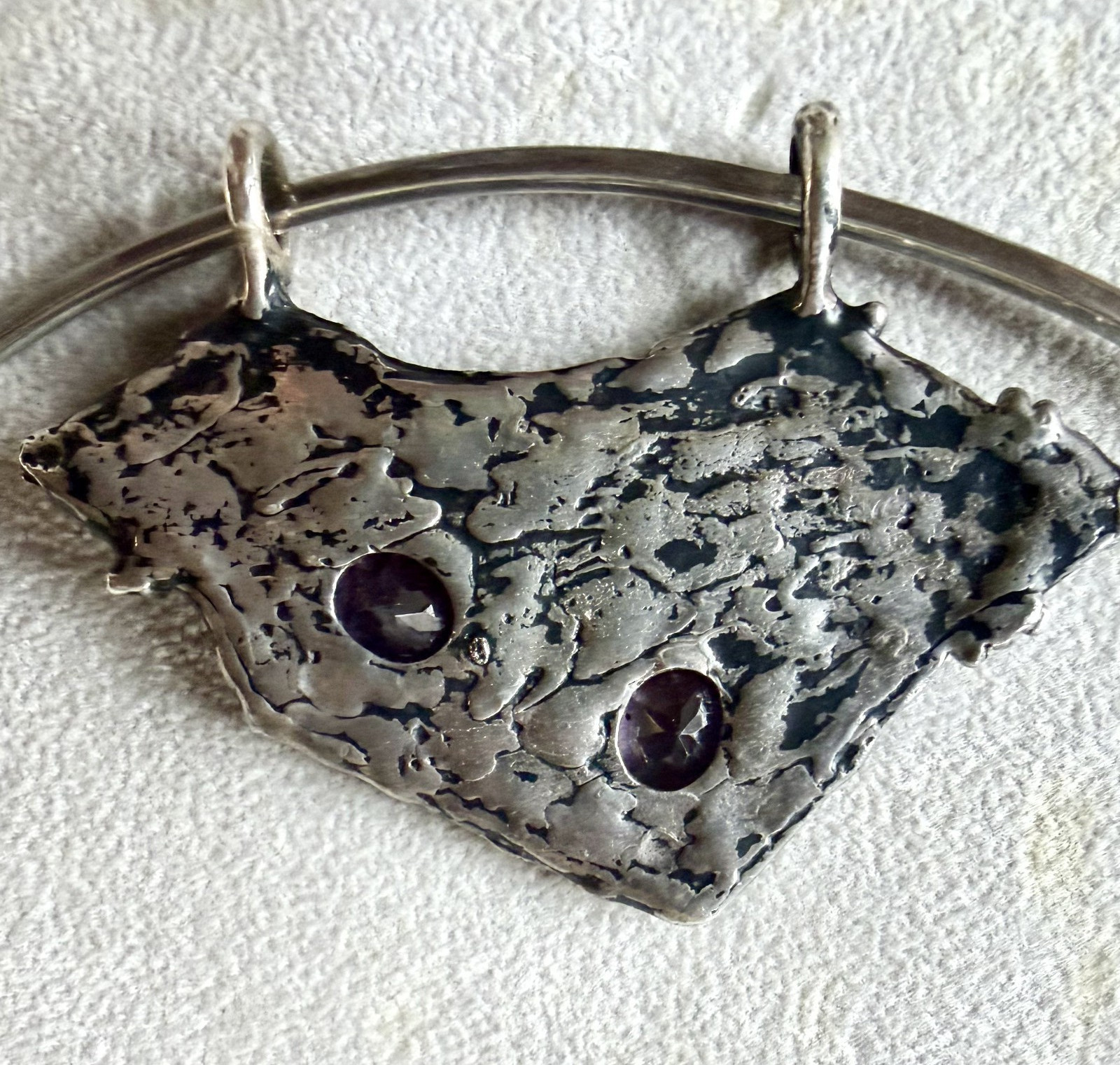 silver collar with silver and amethyst pendant