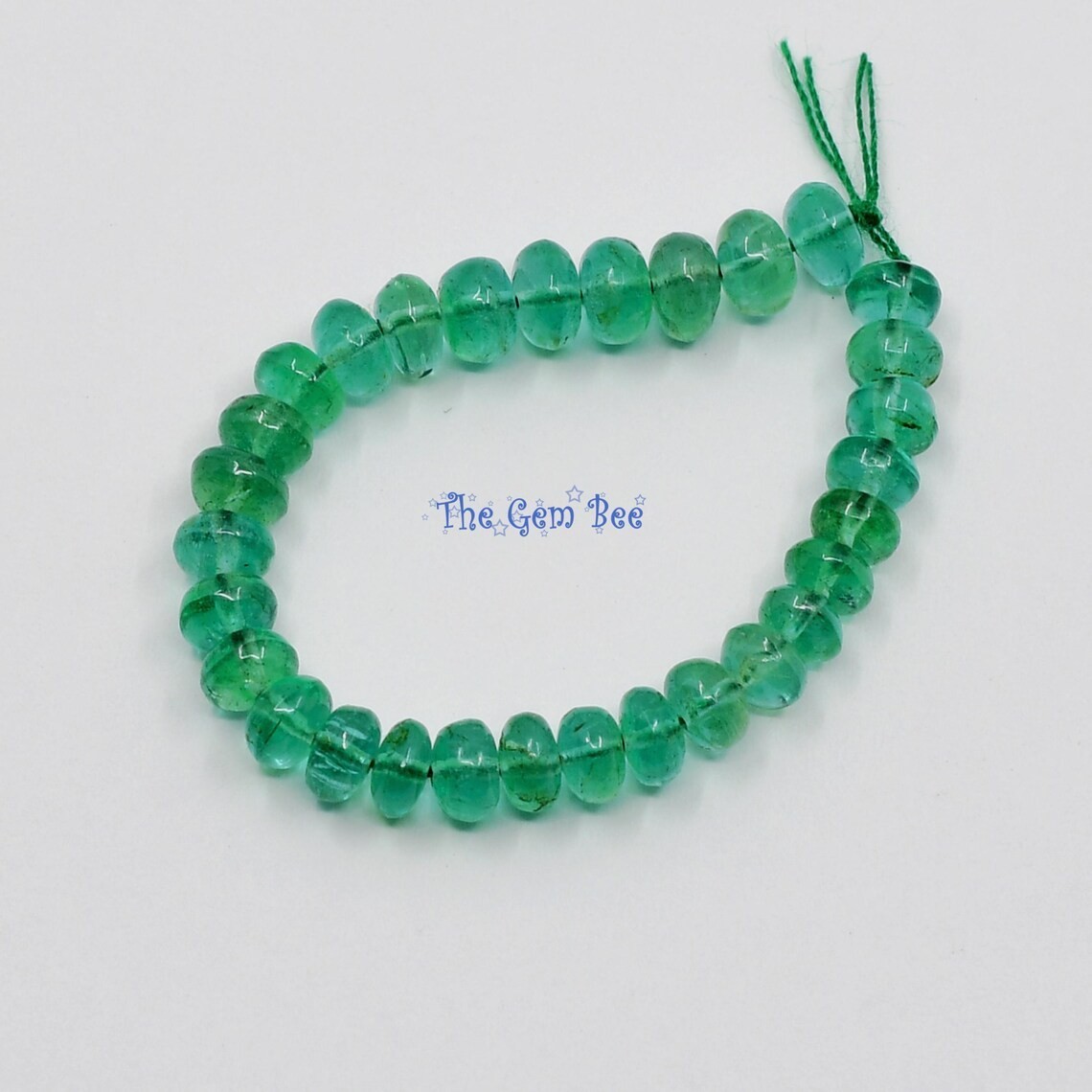 3.8mm-4.3mm Zambian TRANSPARENT Green Emerald Smooth Rondelle Beads 3″ Strand