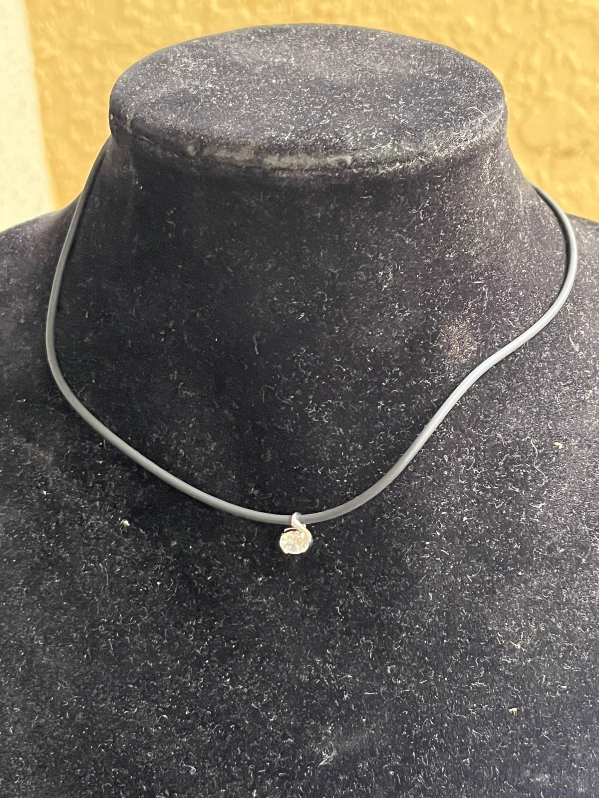 14k Solid White Gold DQ CZ Pendant on a 14K White Gold Clasp Rubber Cord 16″