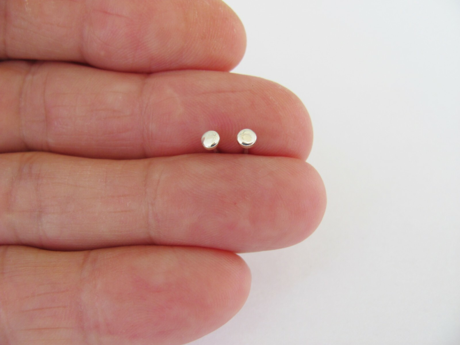 Sterling Silver 3mm Dot post stud earrings.