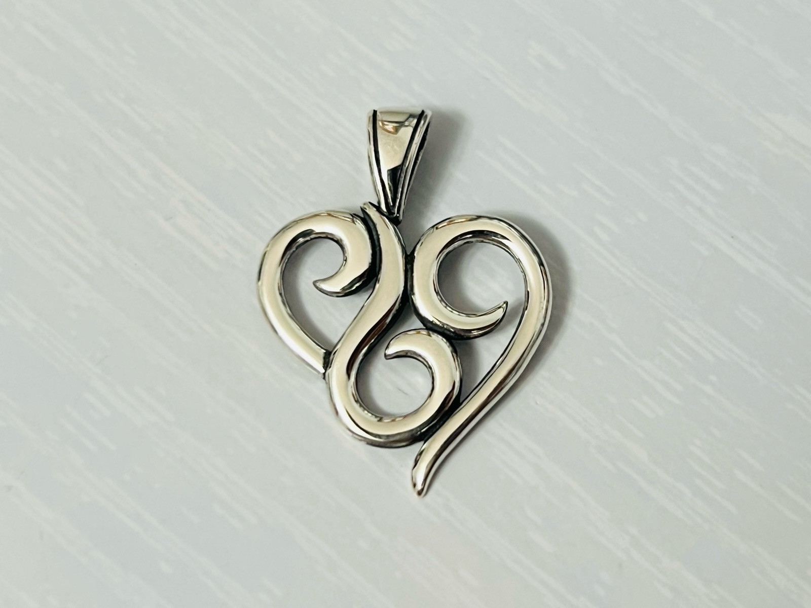 Sterling Silver Swooping Swirl Heart Pendant
