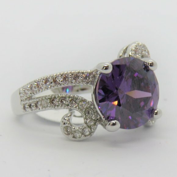10kt White Gold Plated Ring size as shown Amethyst Colored Faceted pave swirl