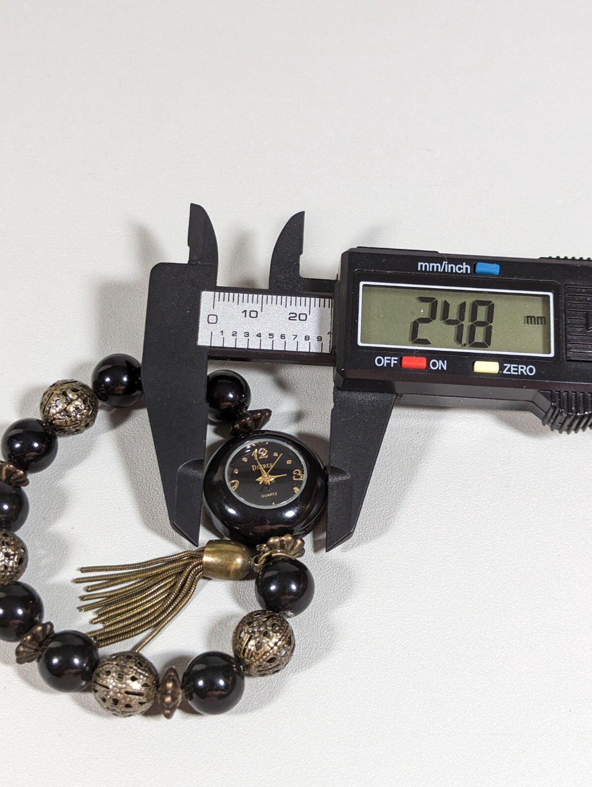 Decree Black Dial Round Black Case Bead Stretch Band Watch Tassel 7 Inch