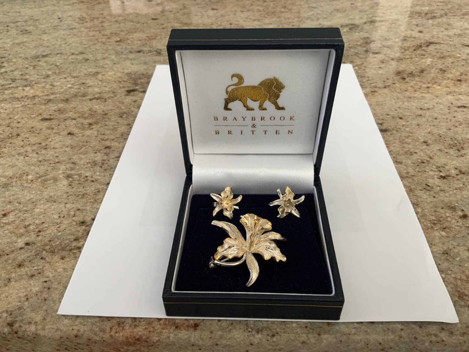 Sterling silver and gold accent orchid brooch and earrings, very good condition