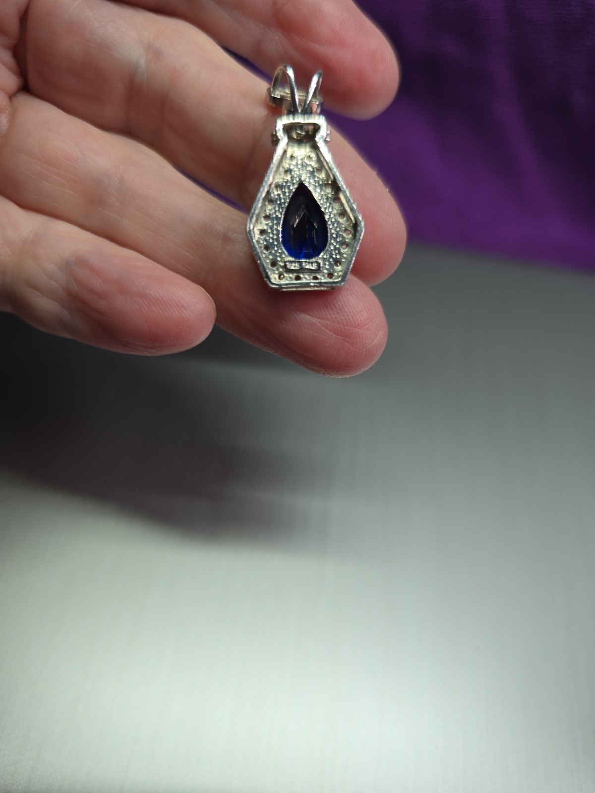Sterling .925 Created Pear Shape Sapphire And Clear Accent Stones Pendant