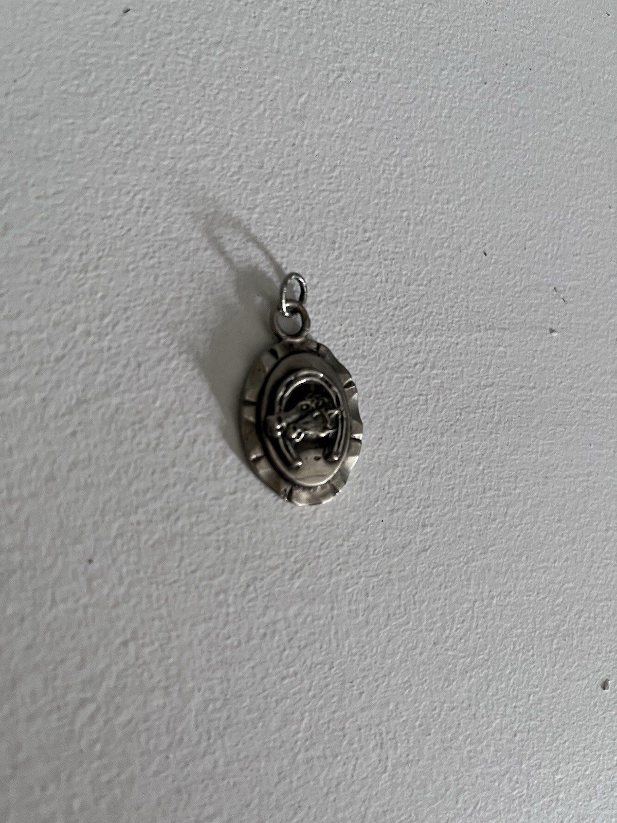 Repop MFG Premier charm, made from Mexican peso coins and brass
