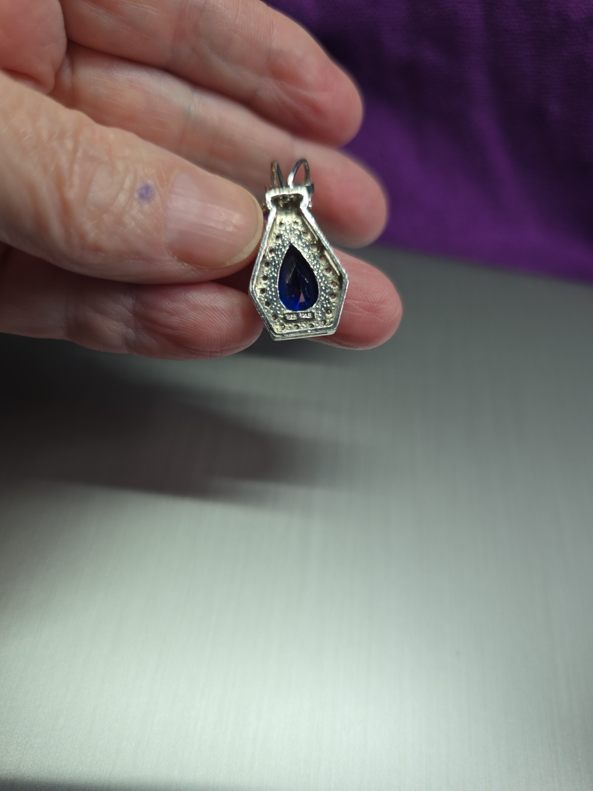 Sterling .925 Created Pear Shape Sapphire And Clear Accent Stones Pendant