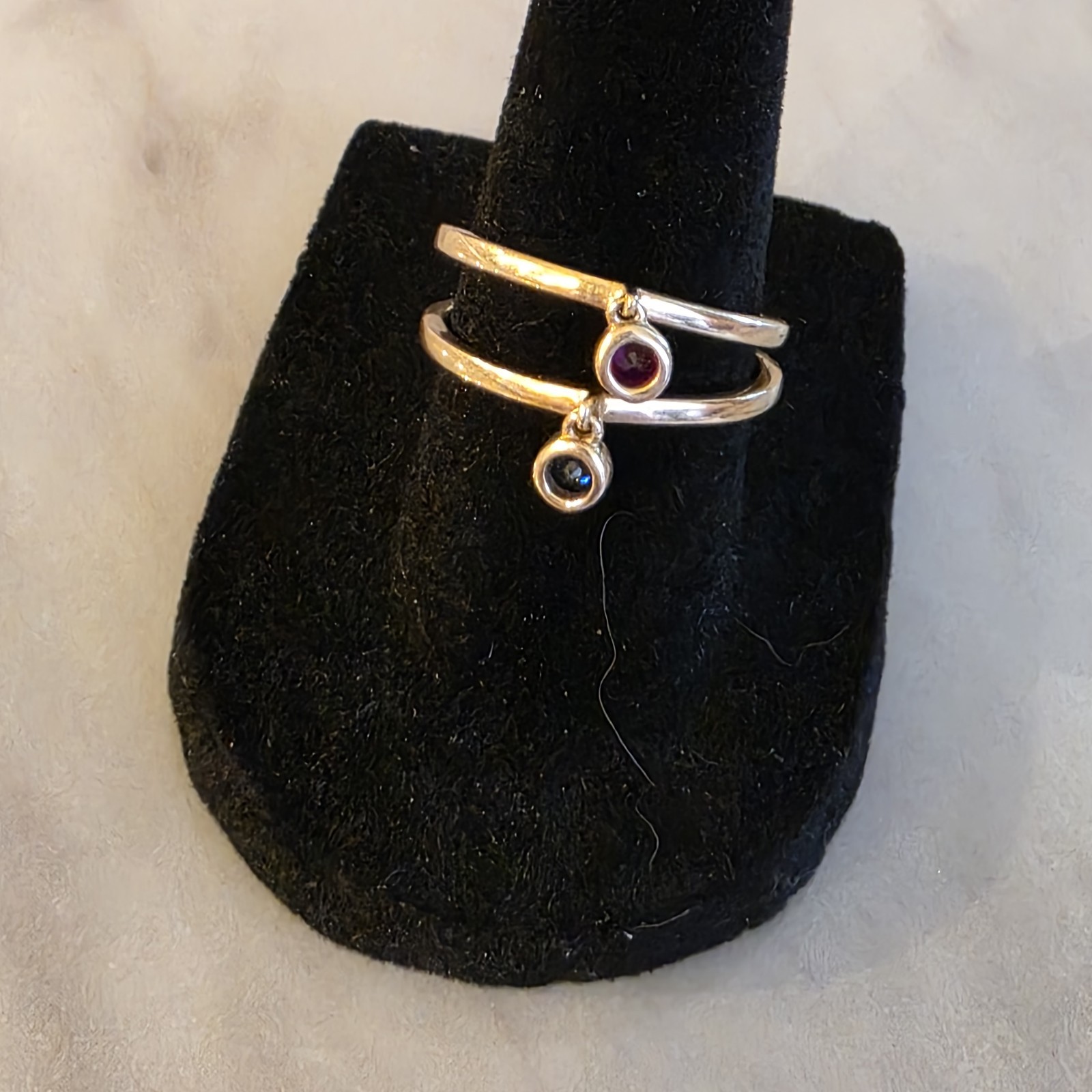 Set of 2 10k Dangle Rings Created Ruby and Sapphire Bezel set stones.