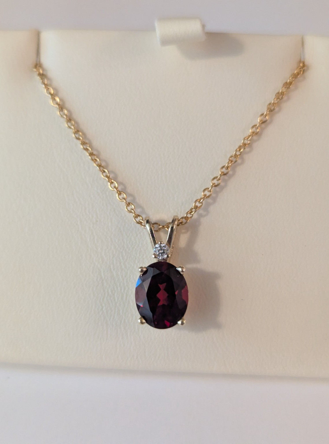 Womans gold pendant 14k yellow garnet