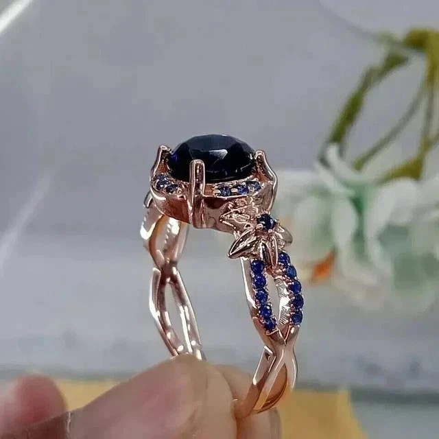Lab-Created Blue Sapphire 2Ct Round Cut Halo Ring 14K Rose Gold Plated Silver
